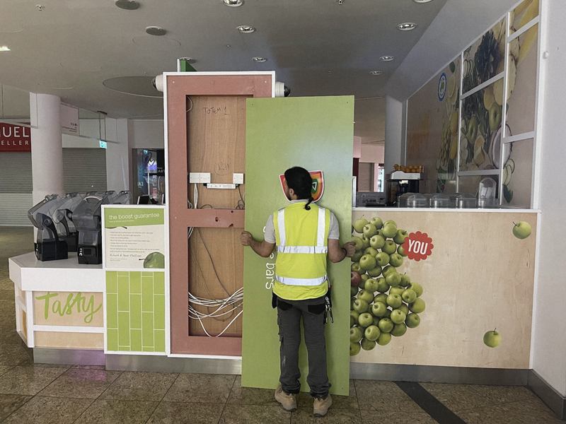 One of the M.A Electrical team fitting out a shopping-centre unit